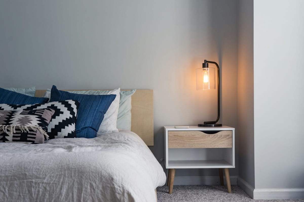 Bright bedroom with exposed beams