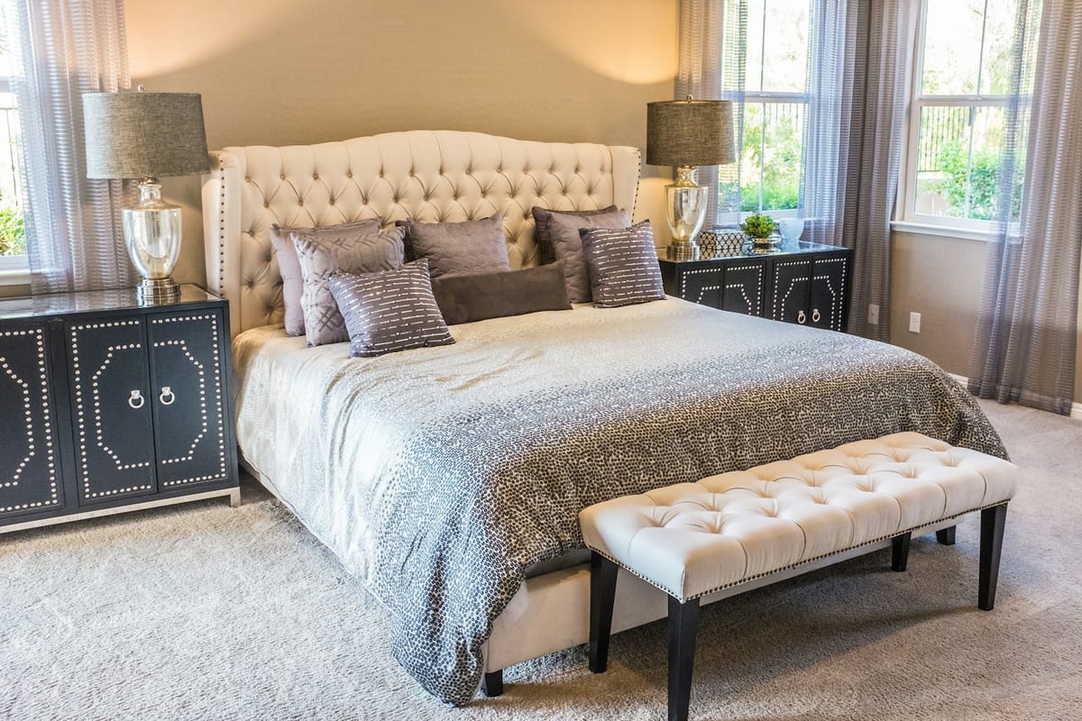 Bedroom with doors onto a garden